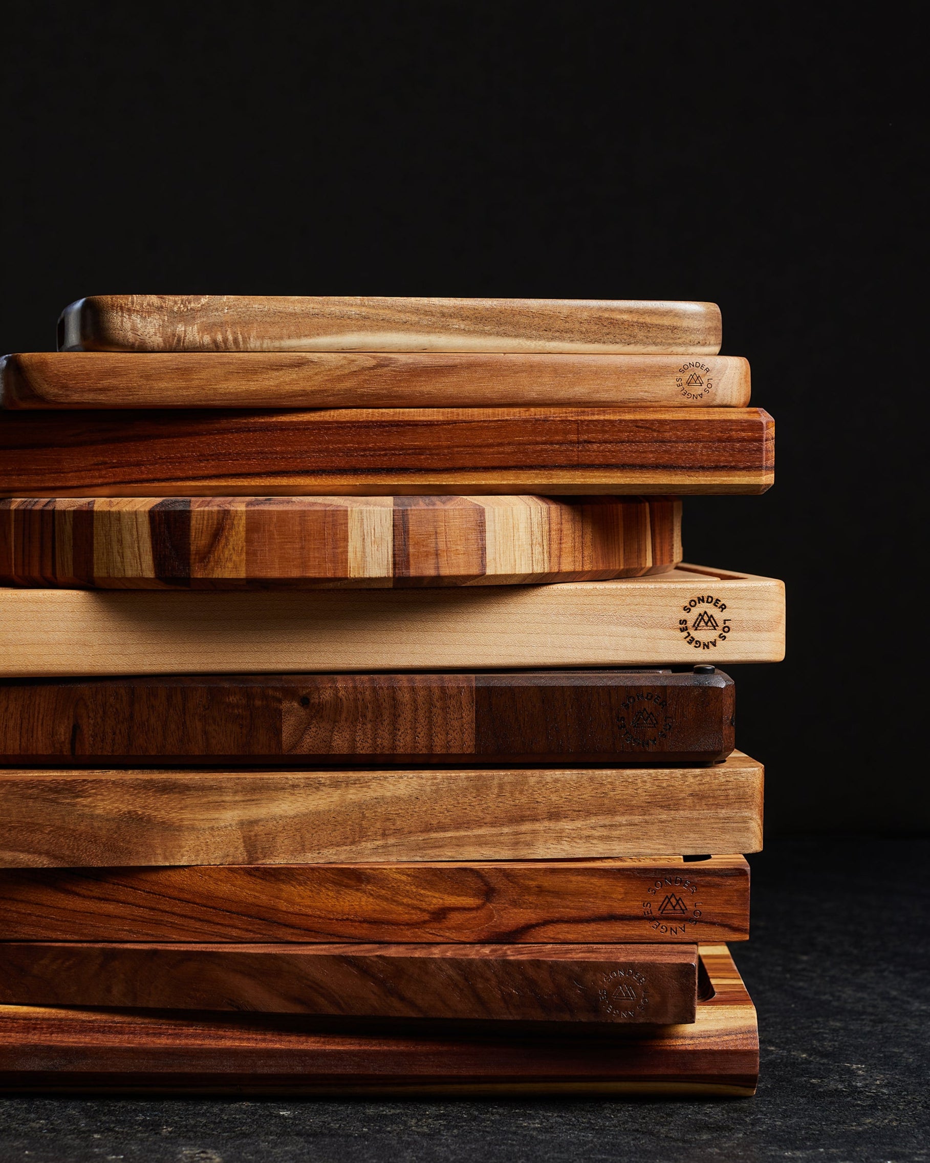 a stack of various cutting boards from SonderLa