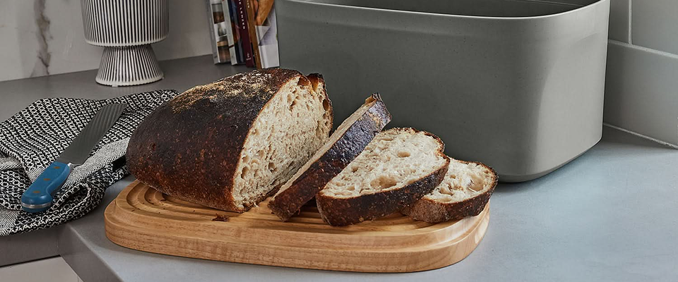 Sliced bread on the lid of a Sonder LA bread box