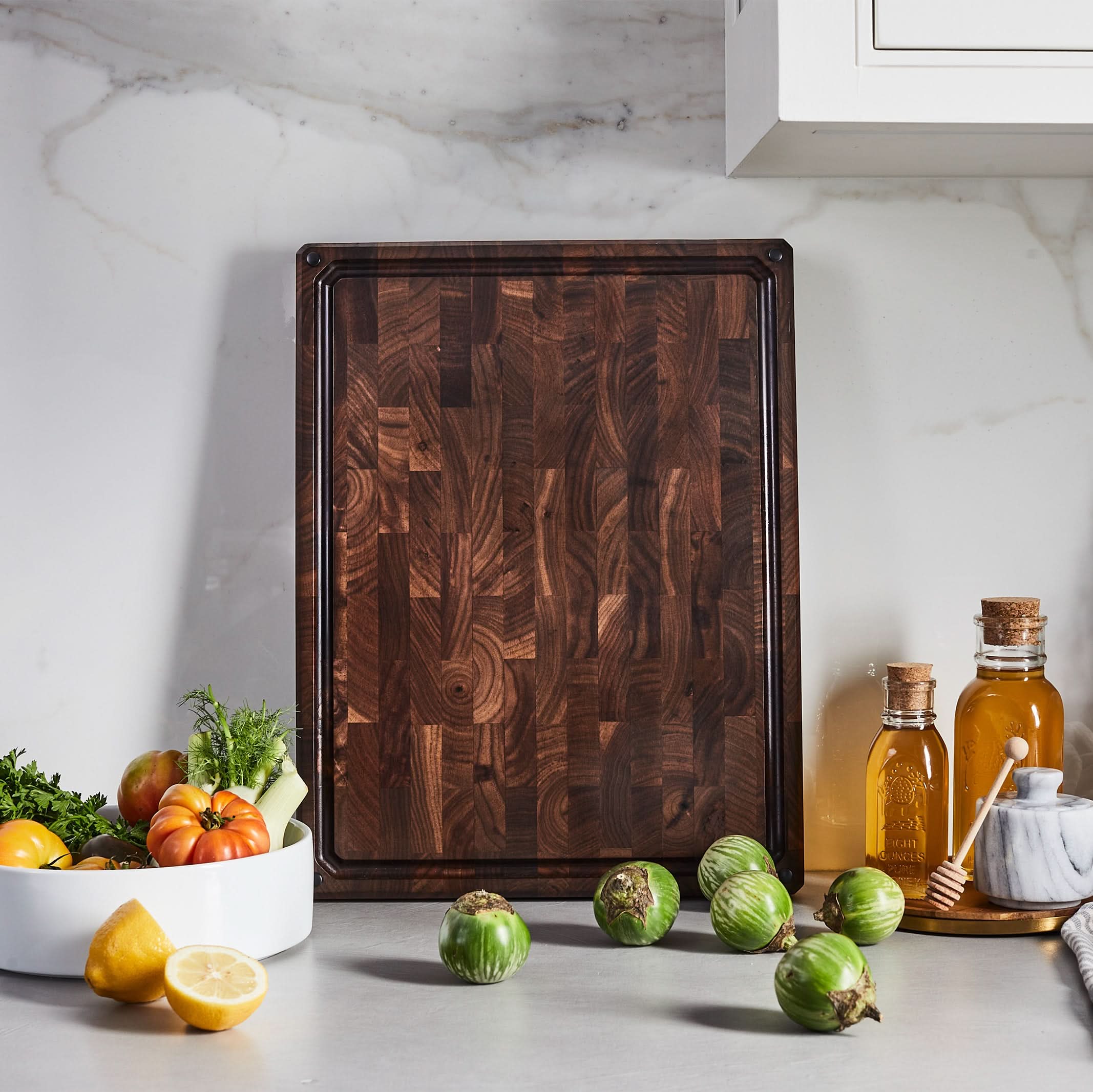 Sonder Los Angeles Made in America Alfred End Grain Walnut Board Displayed in Modern White Kitchen