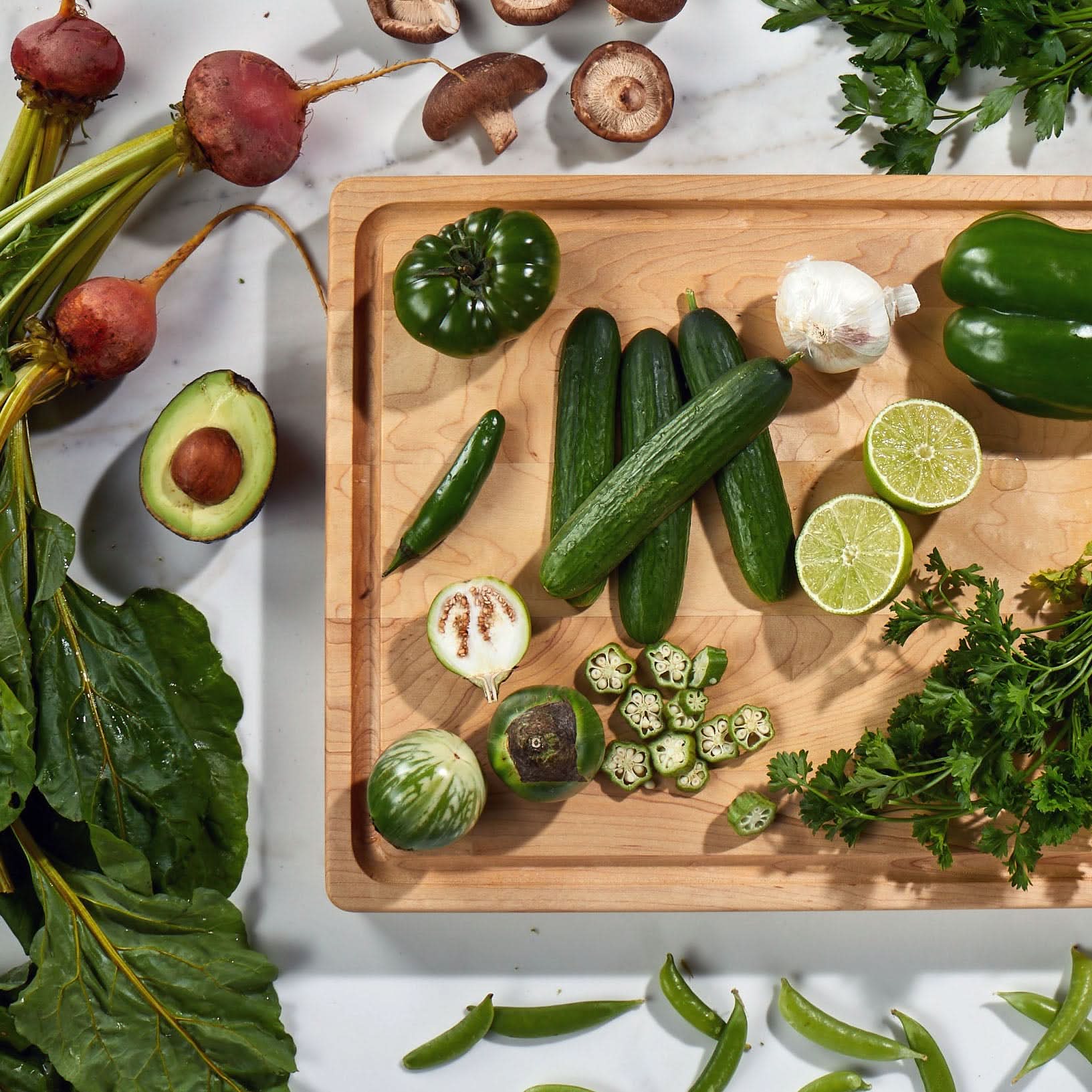 Sonder Los Angeles Made in USA Winsome Maple Wood Cutting Board with Juice Grove Filled with Fresh Produce
