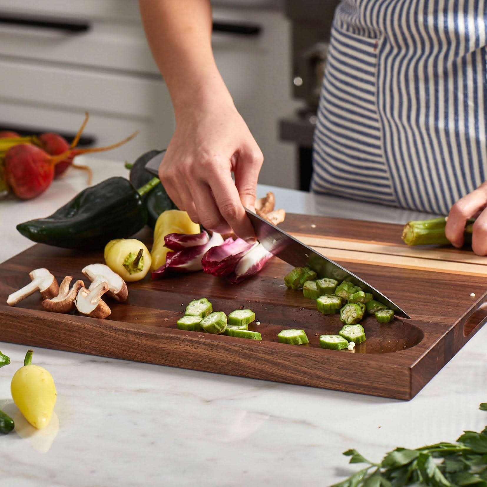Person Using Sonder Los Angeles Motley Cutting Board with Organizing Compartment for Meal Prep