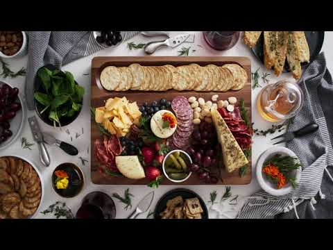 Winsome Acacia Wood Cutting Board by Sonder Los Angeles, features signature built-in cracker well, reversible, multipurpose, multifunctional, with deep juice grooves, and interior handles for easily lifting