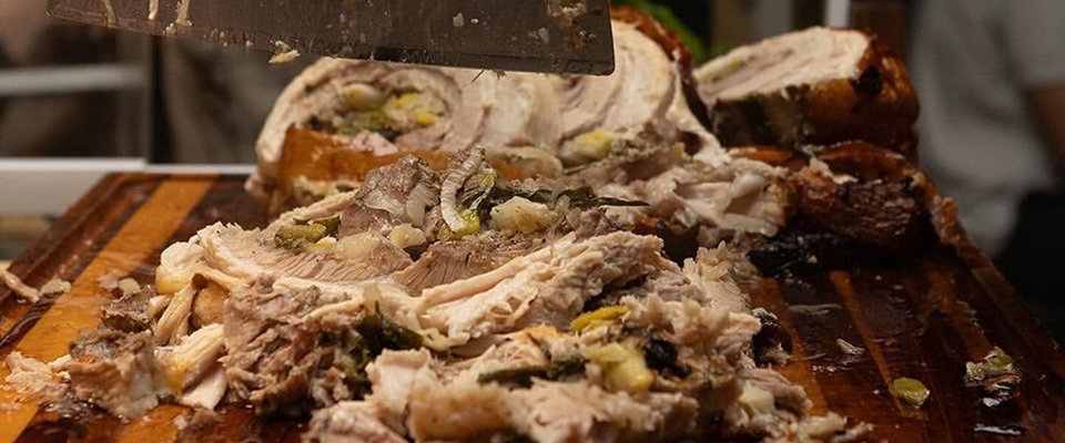 A pork roast on a Sonder LA BBQ Board