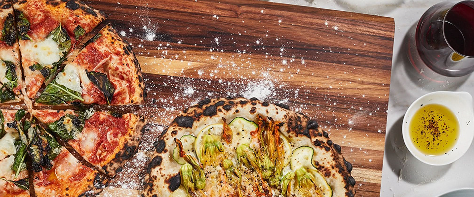 Pizza served on a Sonder LA cutting board